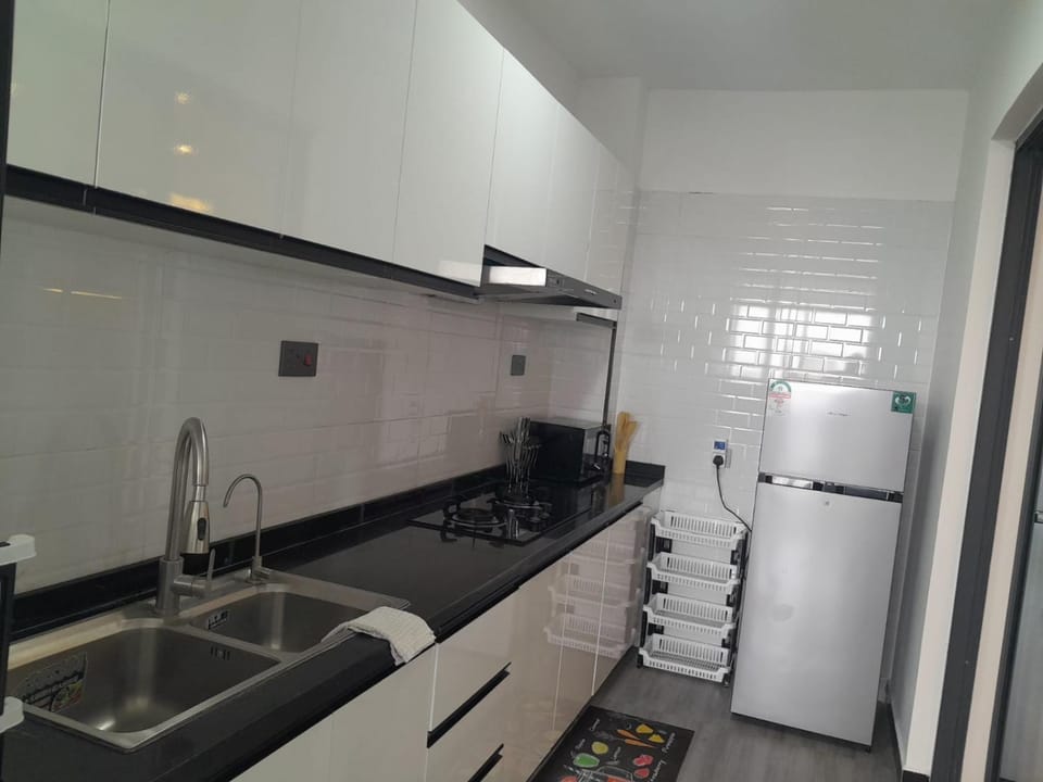 classy executive two bedroom apartment with fully equipped gym ample parking space , swimming pool children playing ground and amazing scenic views which whispers comfort and luxury Apartment in Nairobi