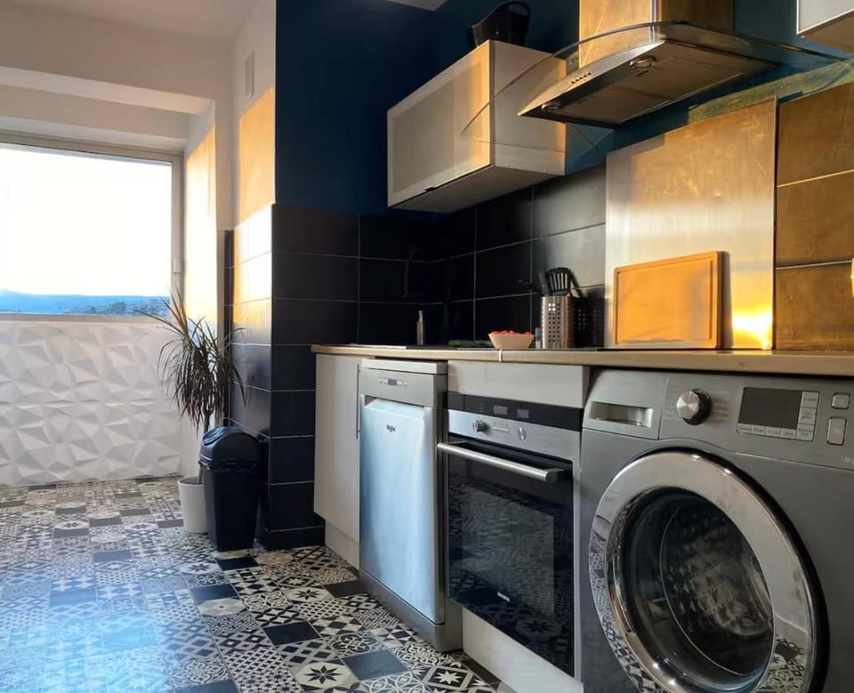 Kitchen or kitchenette, dishwasher, oven, stove, washing machine, dryer