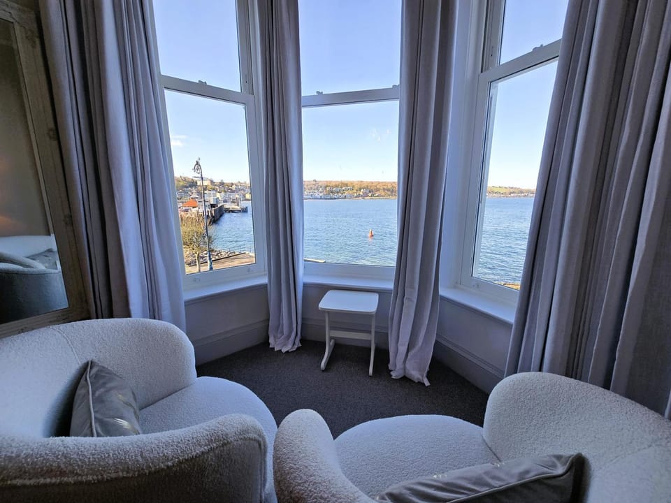 Bed, Natural landscape, View (from property/room), Seating area, Bedroom, Sea view