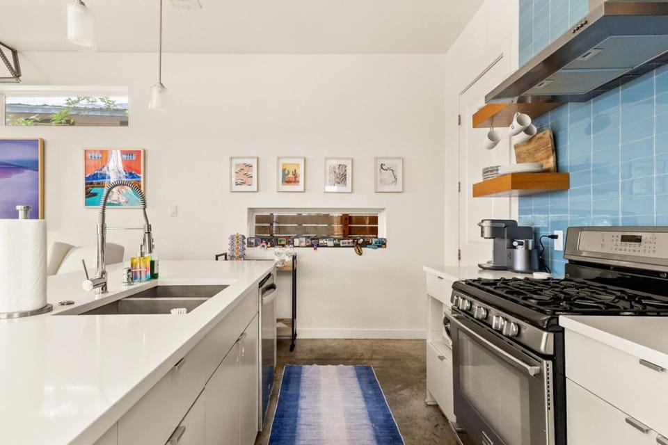 3BR 2BA East Austin Retreat w Putting Green, Sun Deck and Office by Austin Vacay House in Austin