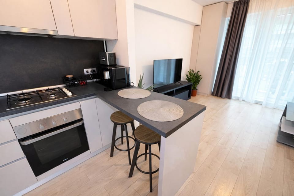 Coffee/tea facilities, Kitchen or kitchenette, Dining area, minibar, oven, toaster