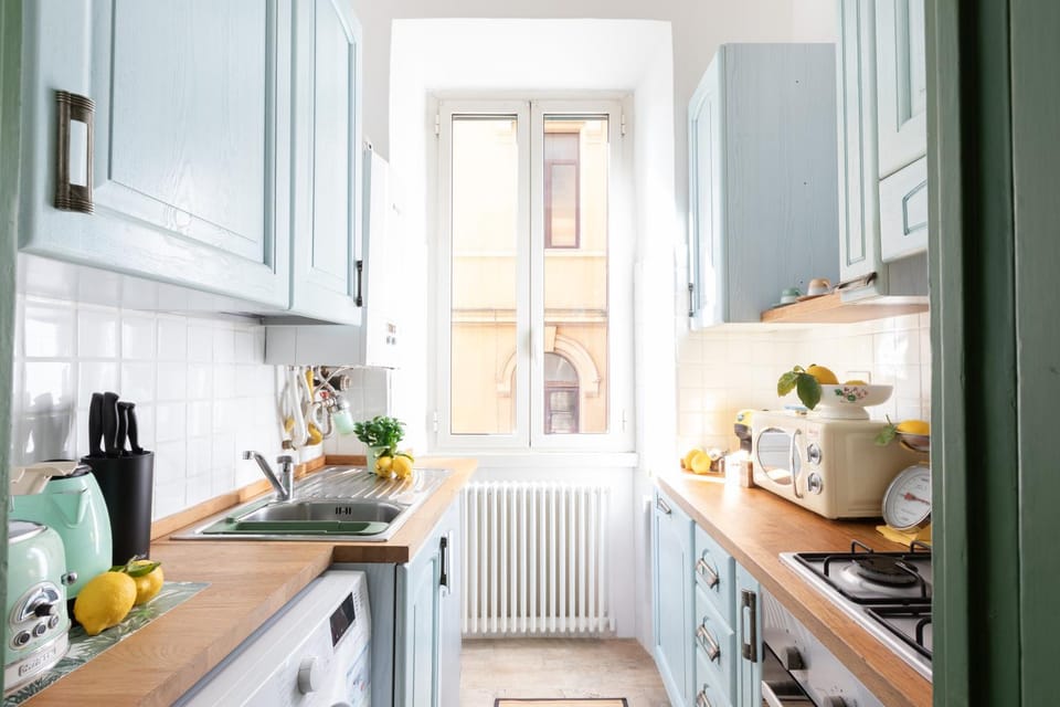 Kitchen or kitchenette, dishwasher, microwave, oven, stove, toaster