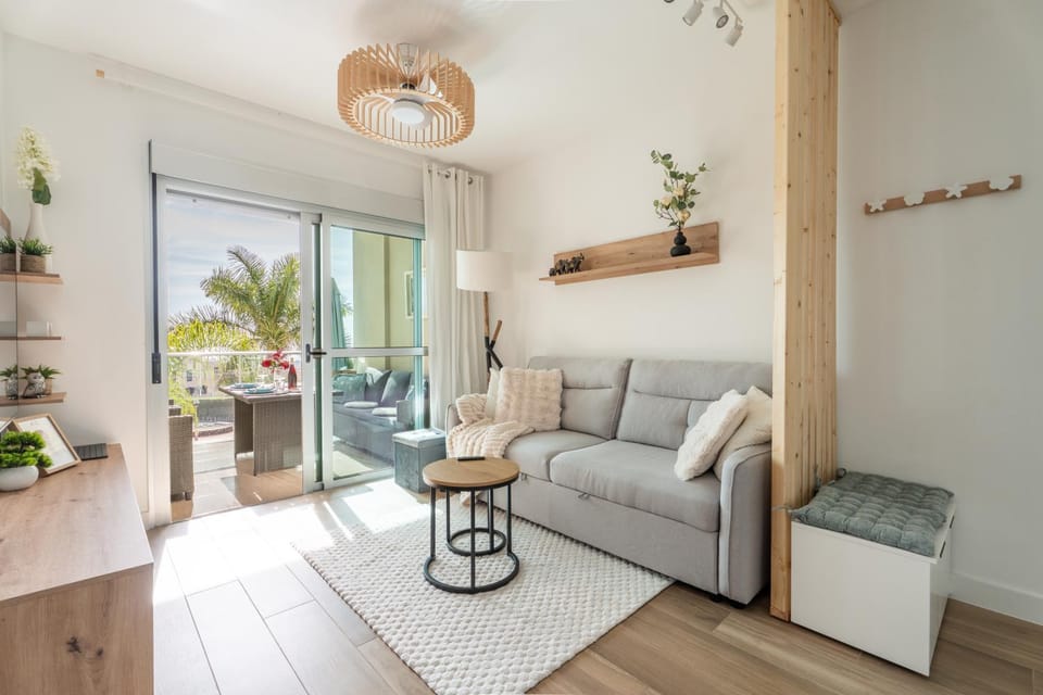 TV and multimedia, Living room, Seating area, Pool view, Sea view