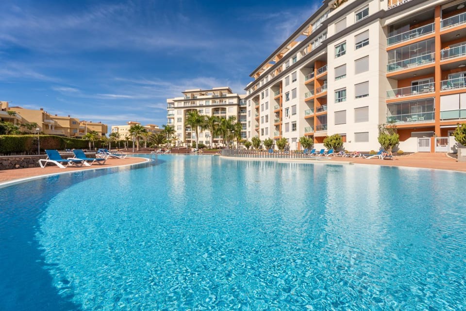 Property building, Pool view, Swimming pool, sunbed