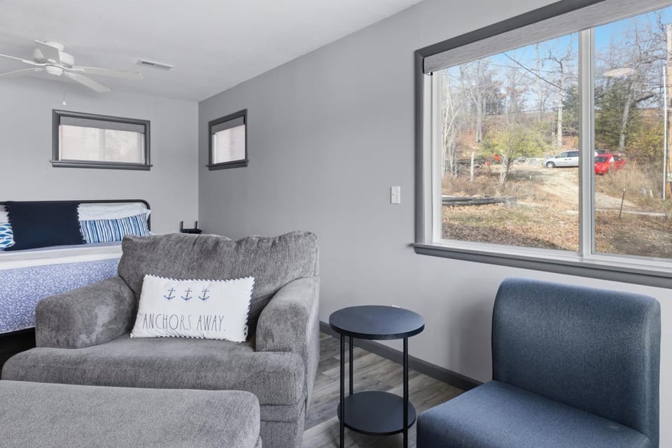 Bed, Living room, Seating area, Bedroom