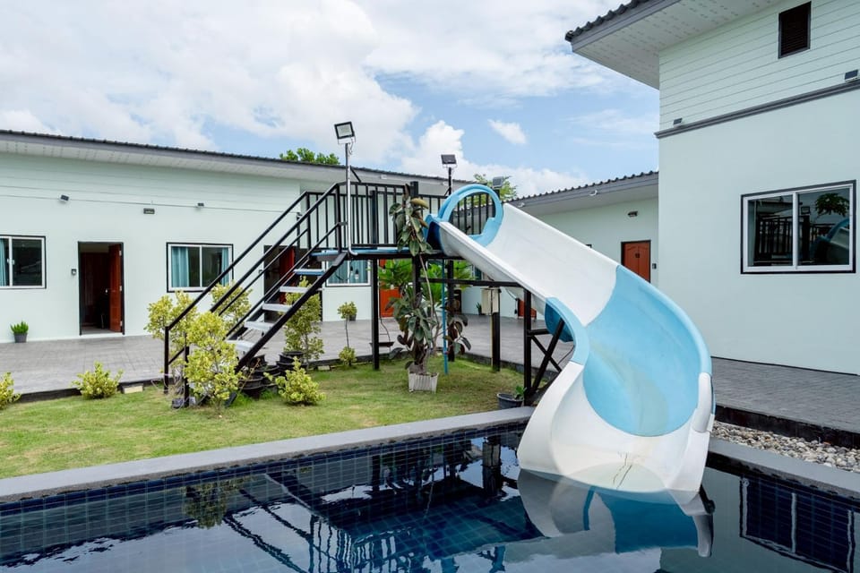 Property building, Day, Children play ground, Pool view, Swimming pool