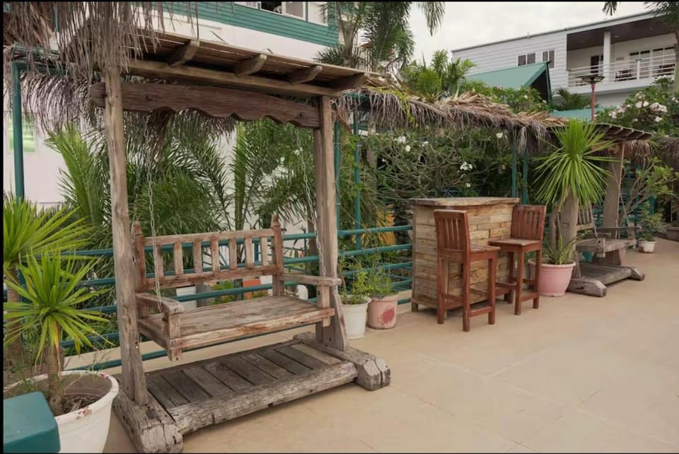 Balcony Beach View Near Tagpuan and Karruba Café Apartment in San Juan
