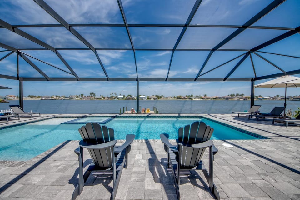 CoralVilla Lake View - pool, spa, water view, on lake, boating, kayaks House in Cape Coral