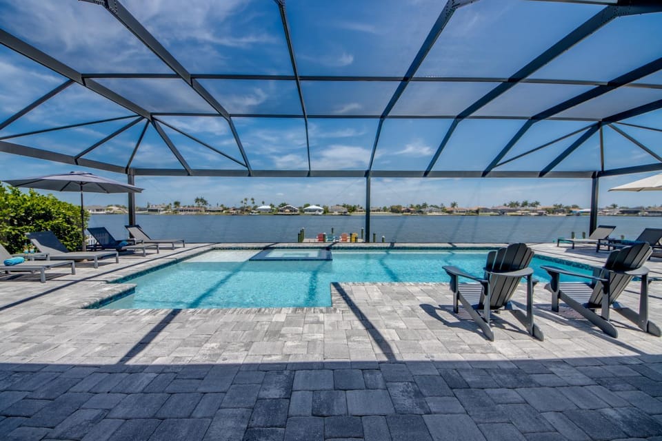CoralVilla Lake View - pool, spa, water view, on lake, boating, kayaks House in Cape Coral