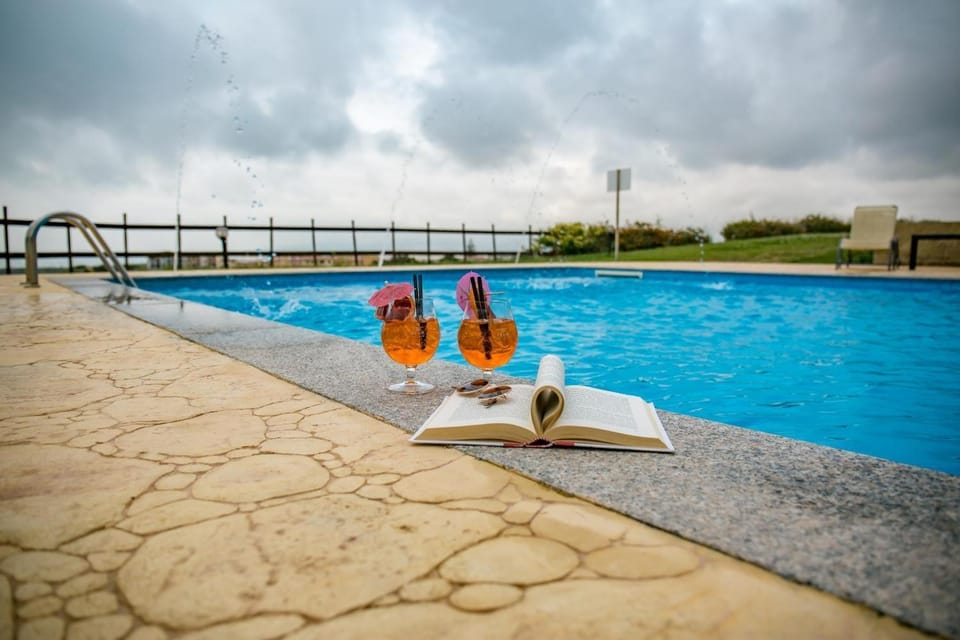 Property building, Living room, Swimming pool