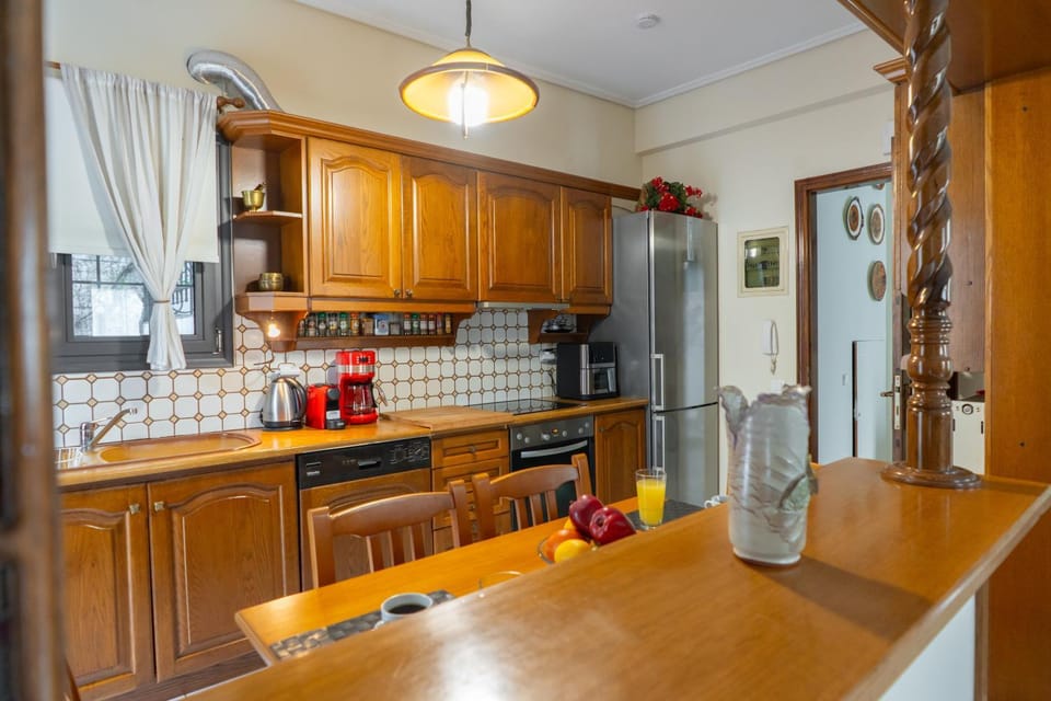 Kitchen or kitchenette, dishwasher, oven, stove, toaster