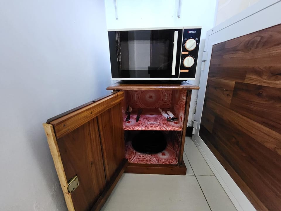 Kitchen or kitchenette, microwave