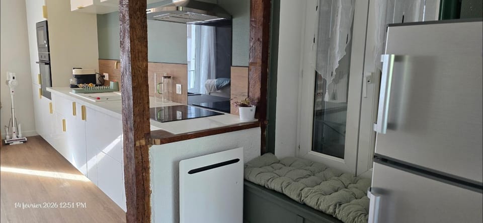 Kitchen or kitchenette, dishwasher, oven, stove