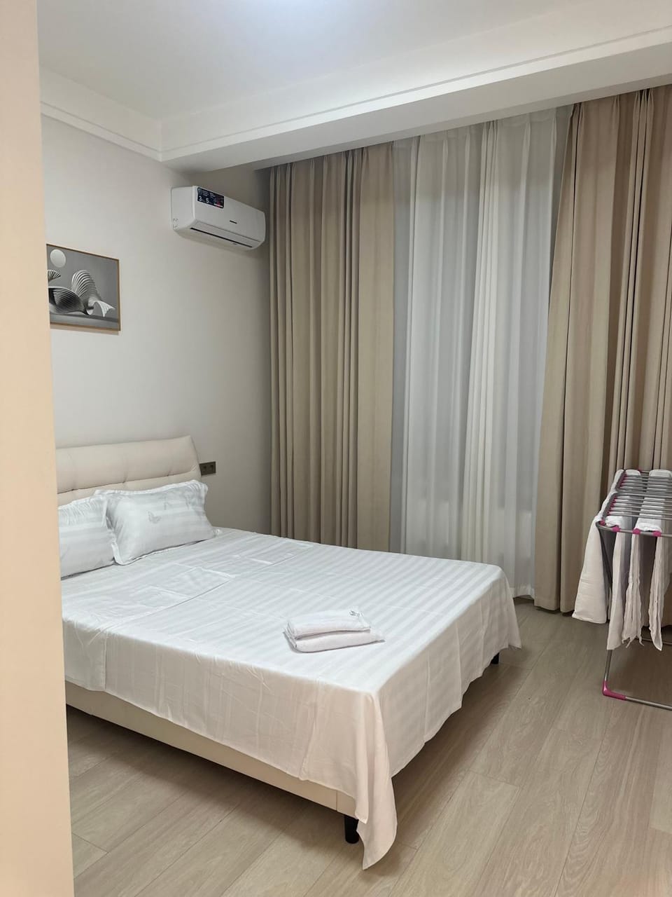 Bed, Photo of the whole room, Bedroom, towels, air conditioner