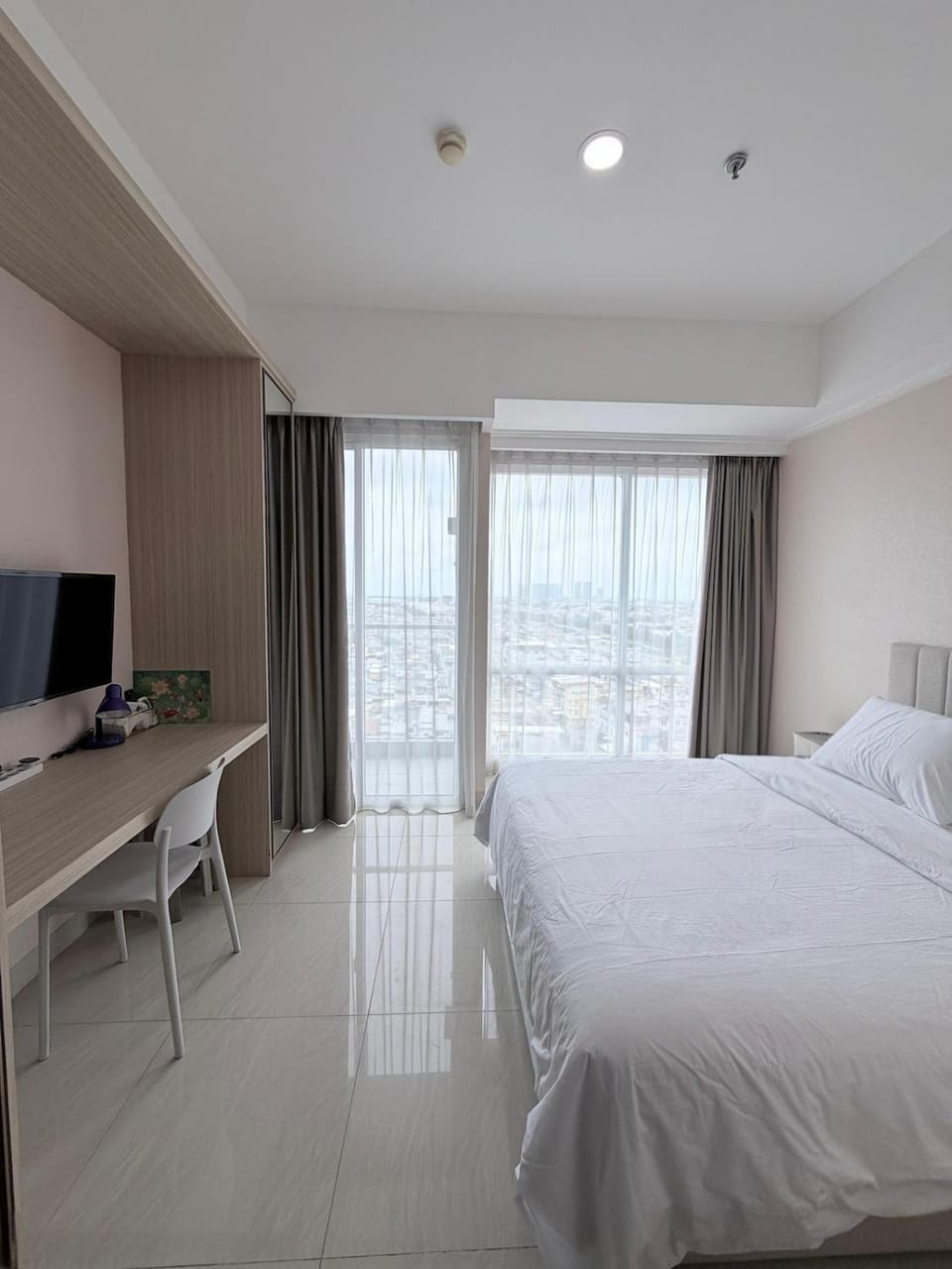 Green Sedayu Apartment PIK City View by Ellison Apartment in Jakarta