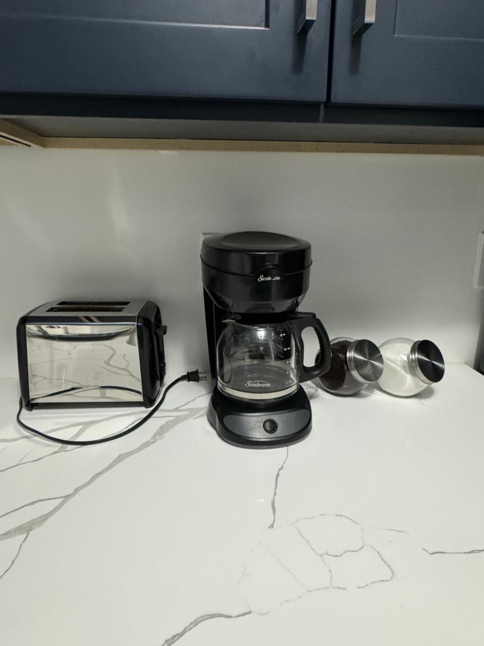 Kitchen or kitchenette, toaster