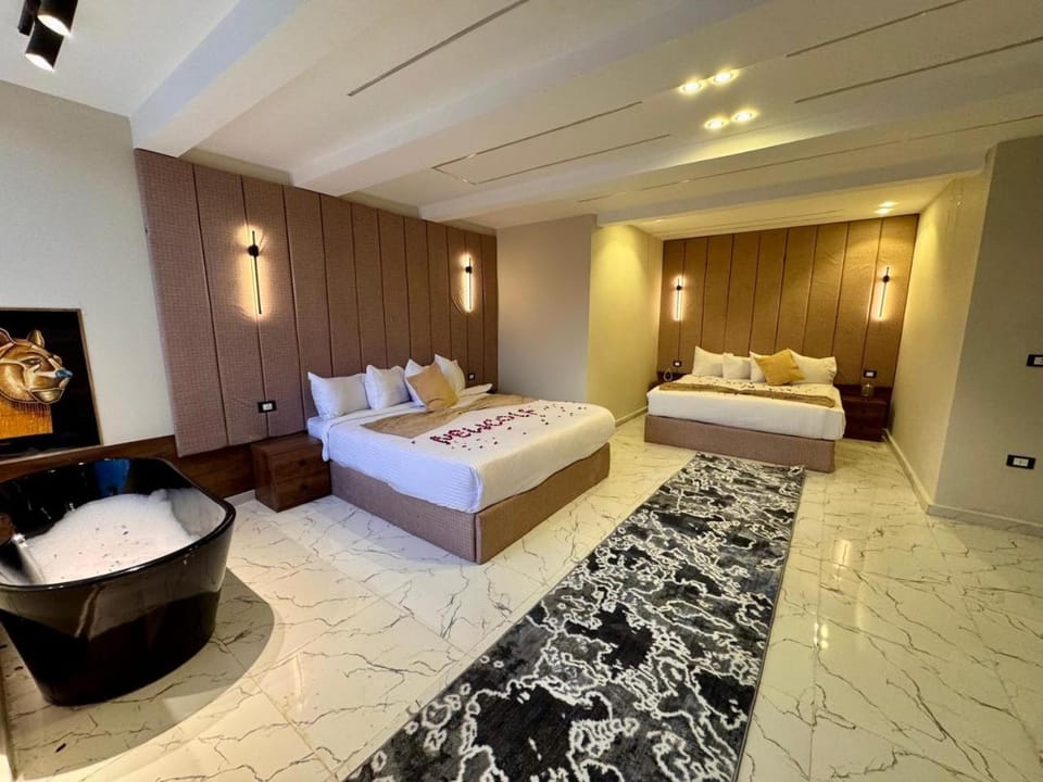 Bed, Living room, Photo of the whole room, Seating area, Bedroom, towels
