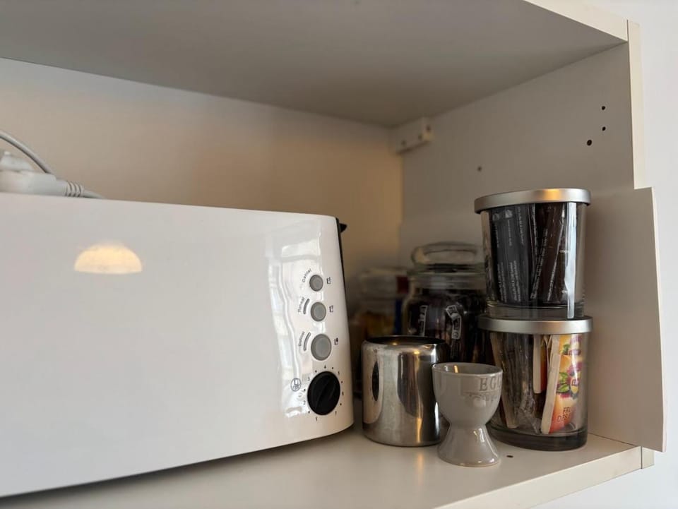 Kitchen or kitchenette, toaster