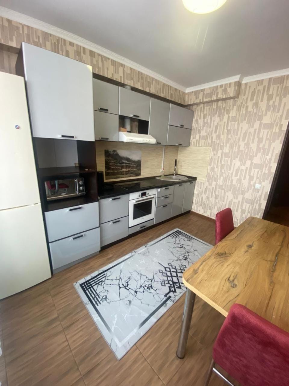 Kitchen or kitchenette, oven