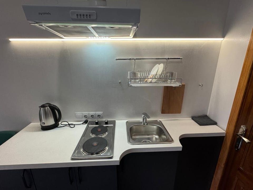 Kitchen or kitchenette, stove