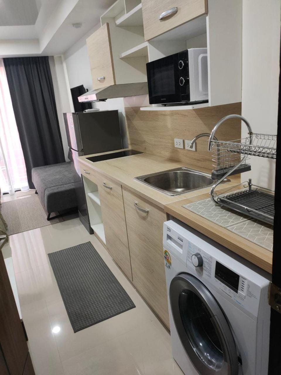 Kitchen or kitchenette, Swimming pool, stove, washing machine