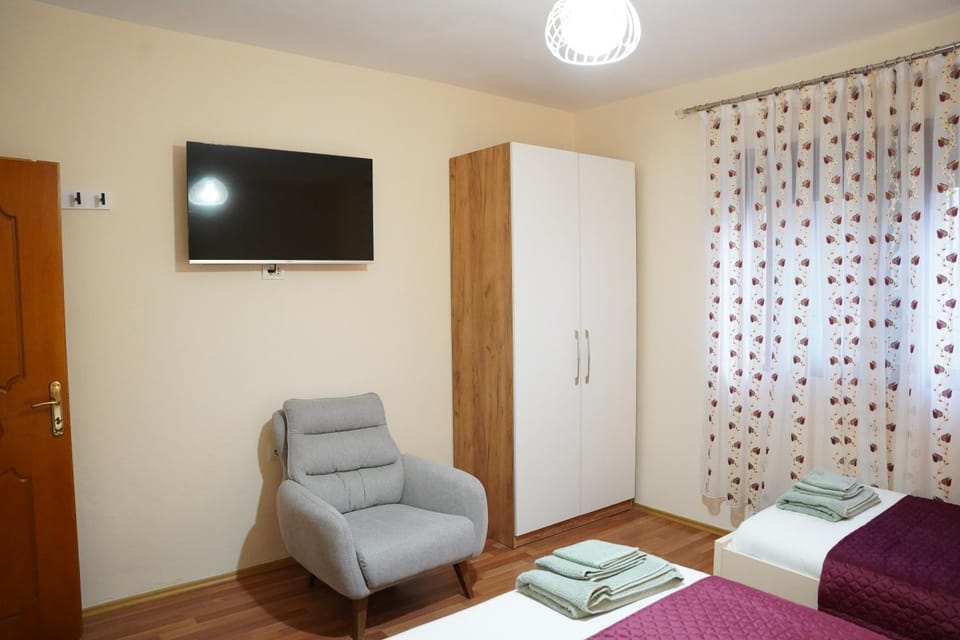 Seating area, Bedroom, towels, wardrobe