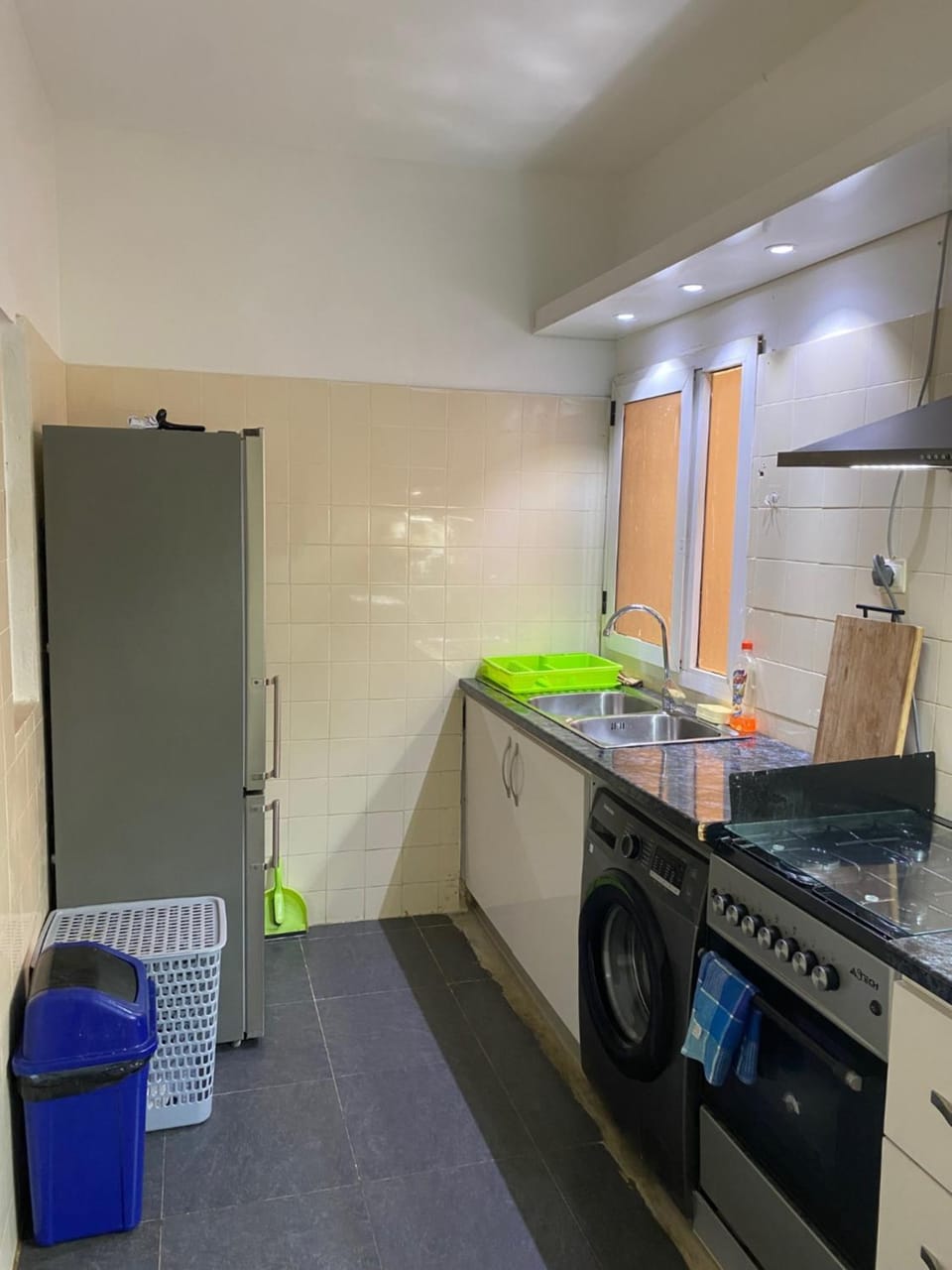 Kitchen or kitchenette, oven, stove, washing machine