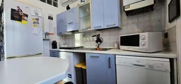 Kitchen or kitchenette, dishwasher, microwave, stove, kitchen