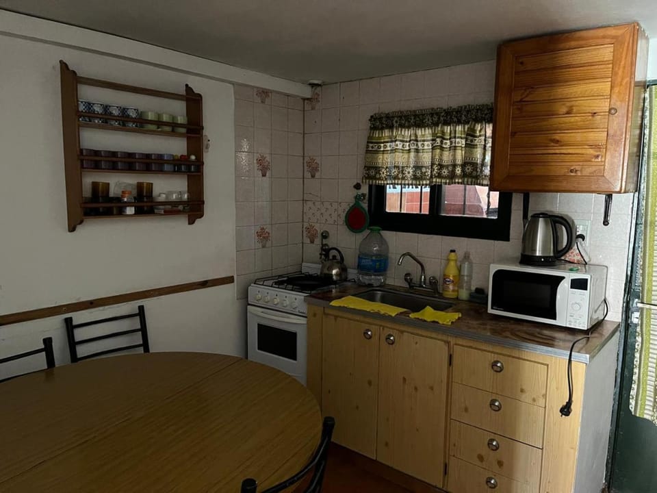 Kitchen or kitchenette, oven, stove