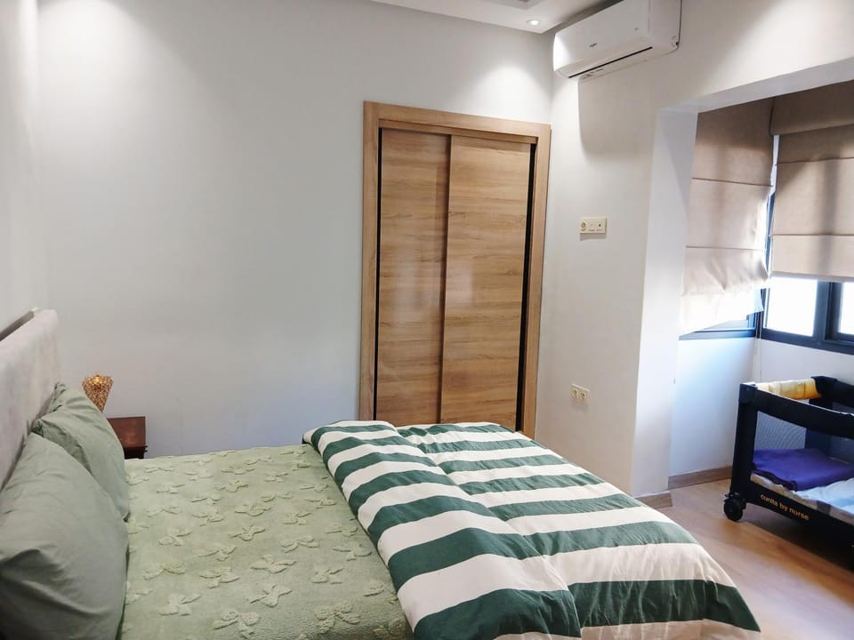 Bed, air conditioner