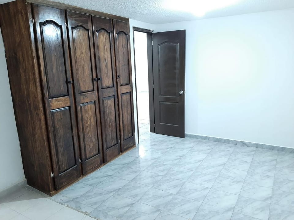 Casa planta baja 4 camas matrimoniales 1 colchón individual, garaje, UAEH Apartment in Pachuca