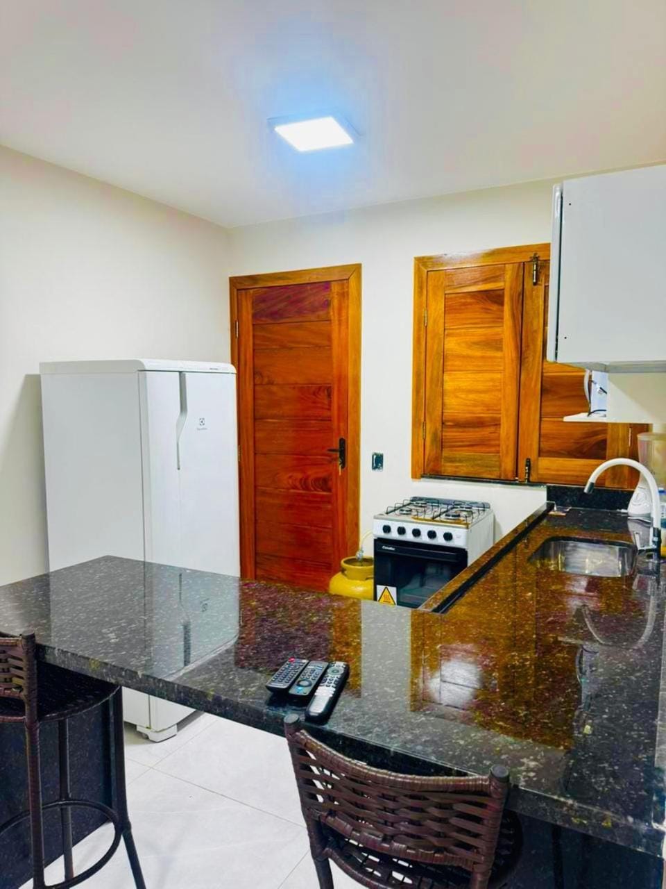 Kitchen or kitchenette, stove