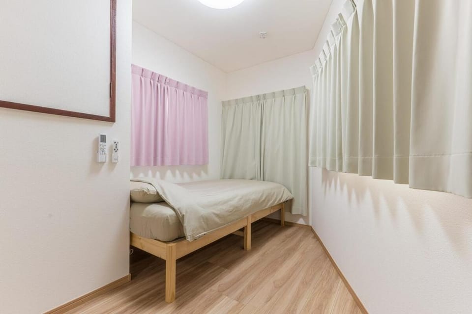 2-min Hankyu Kunijima Easy access to Umeda Namba Apartment in Osaka