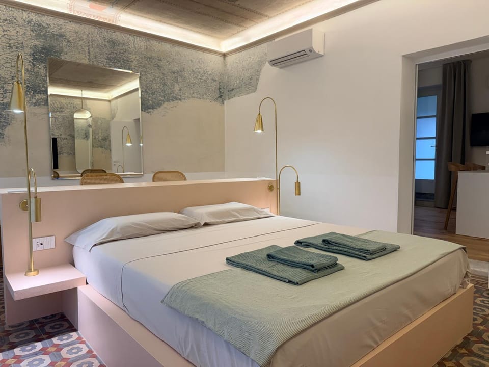 Bed, Photo of the whole room, Bedroom, towels, air conditioner