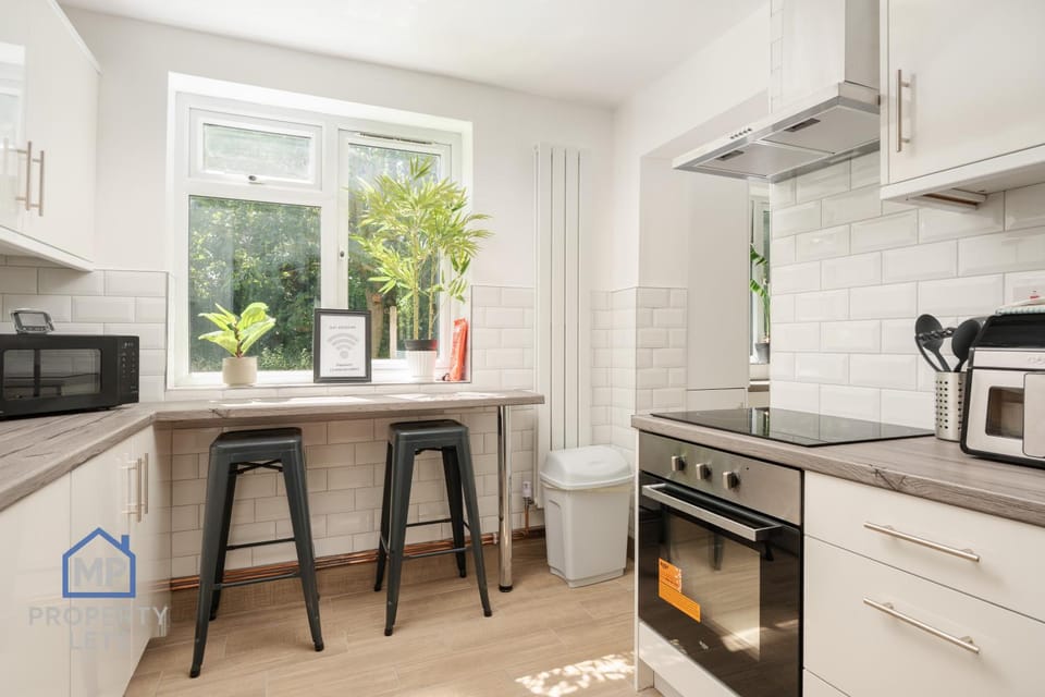 Kitchen or kitchenette, oven, stove, toaster
