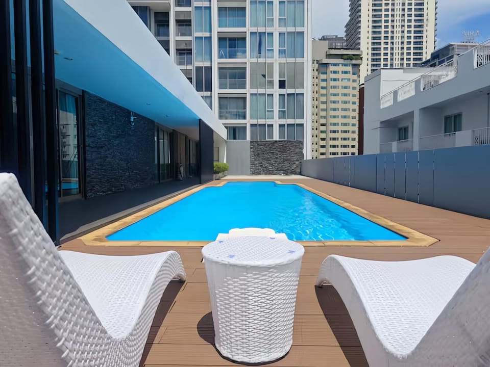 Property building, View (from property/room), Pool view, Swimming pool, sunbed