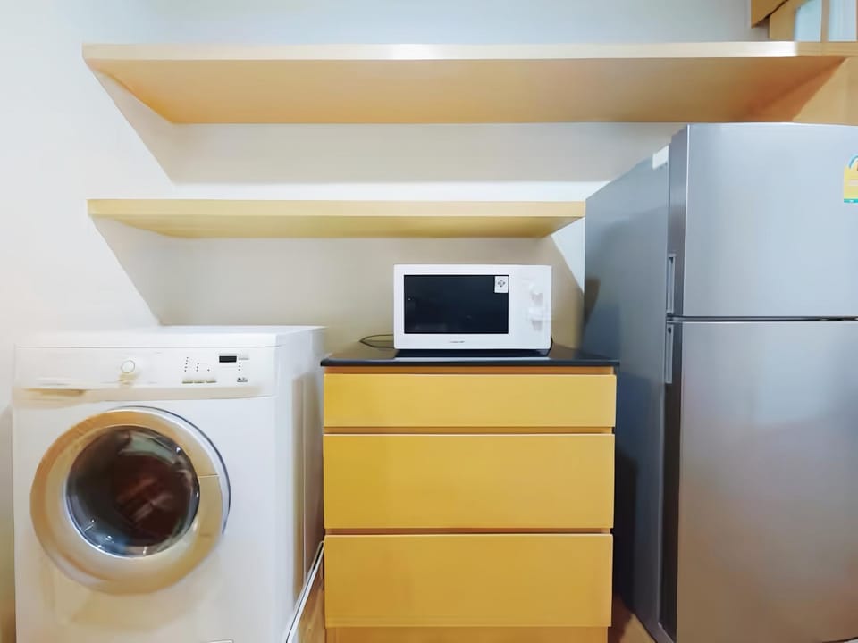 Kitchen or kitchenette, washing machine