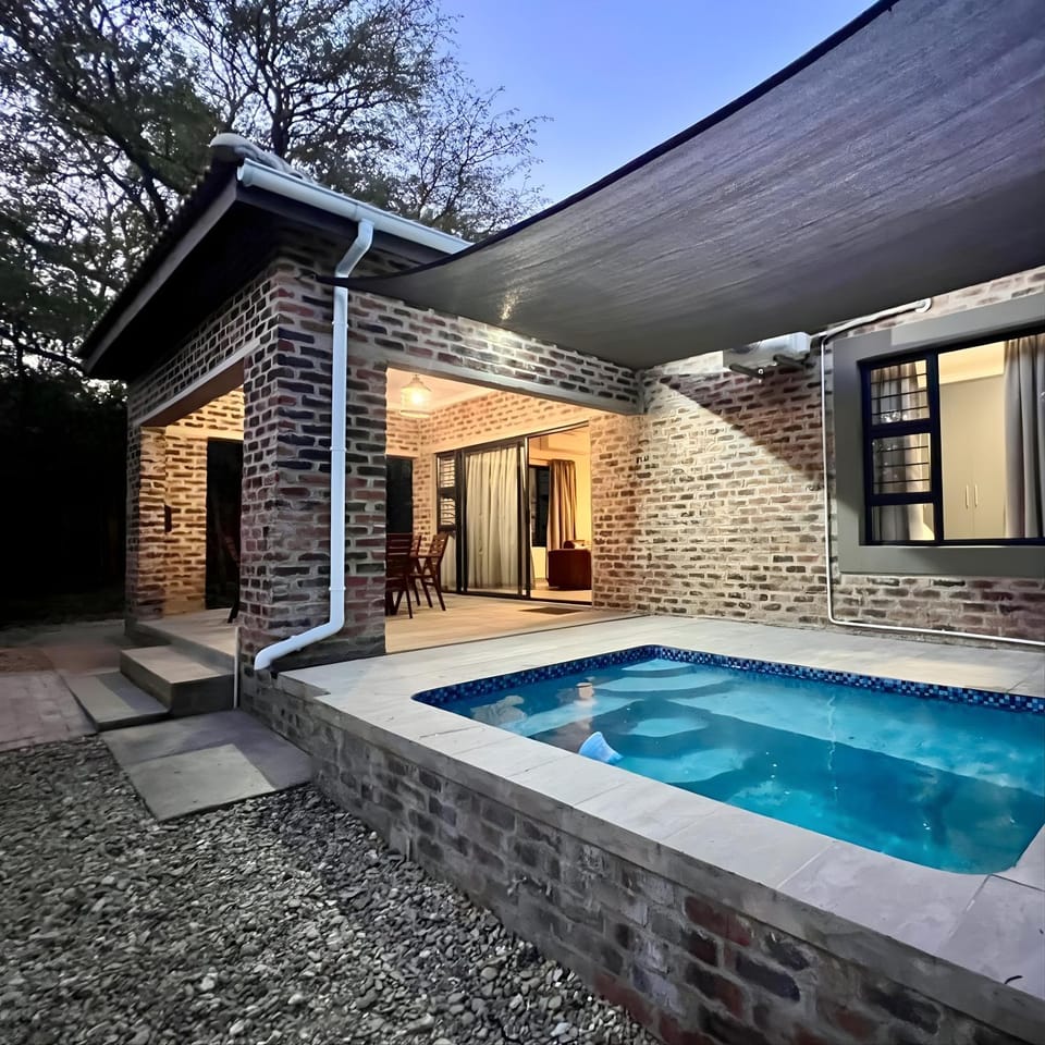 Property building, Patio, Pool view, Swimming pool