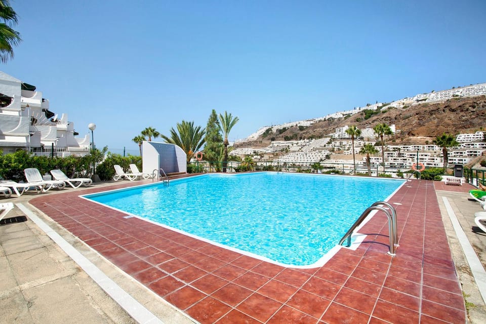 Property building, Living room, Swimming pool