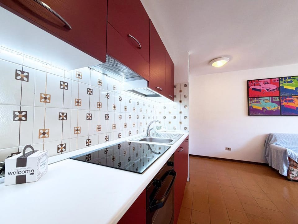 Kitchen or kitchenette, oven, stove