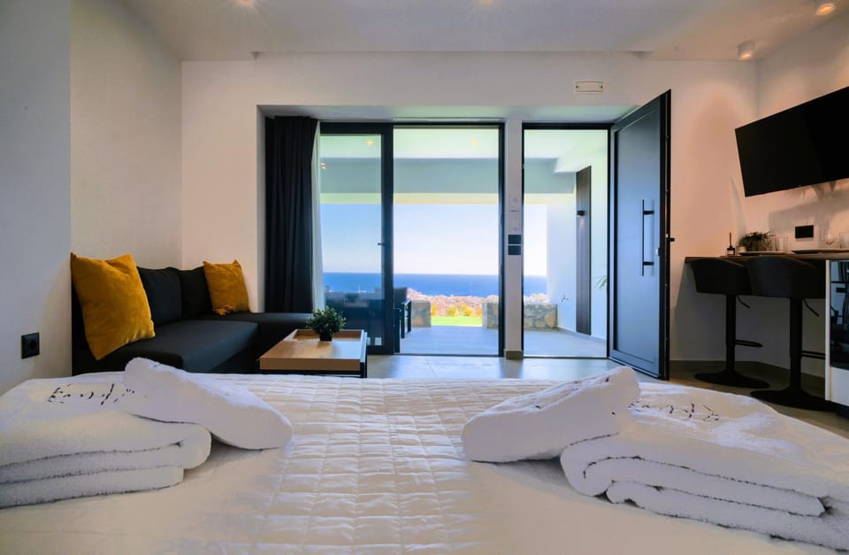Bed, Seating area, Sea view
