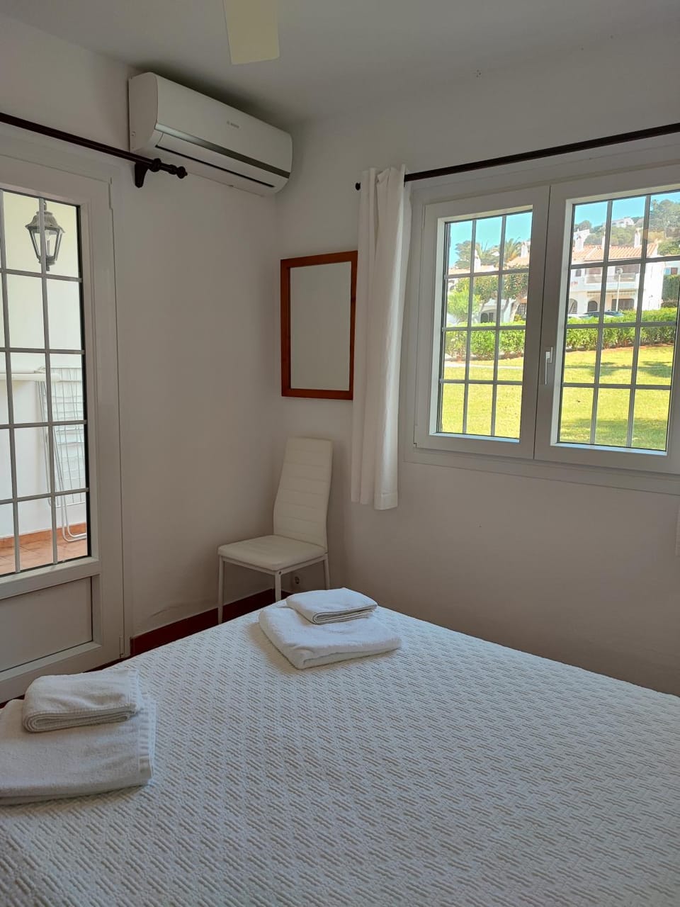 Bed, Photo of the whole room, Bedroom, towels, air conditioner