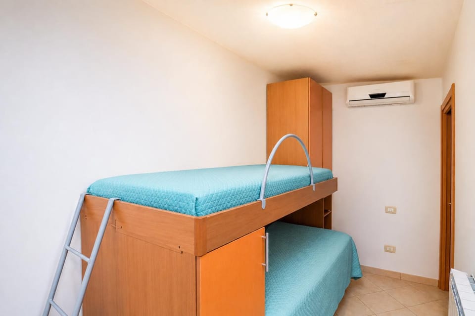 Bed, wardrobe, air conditioner