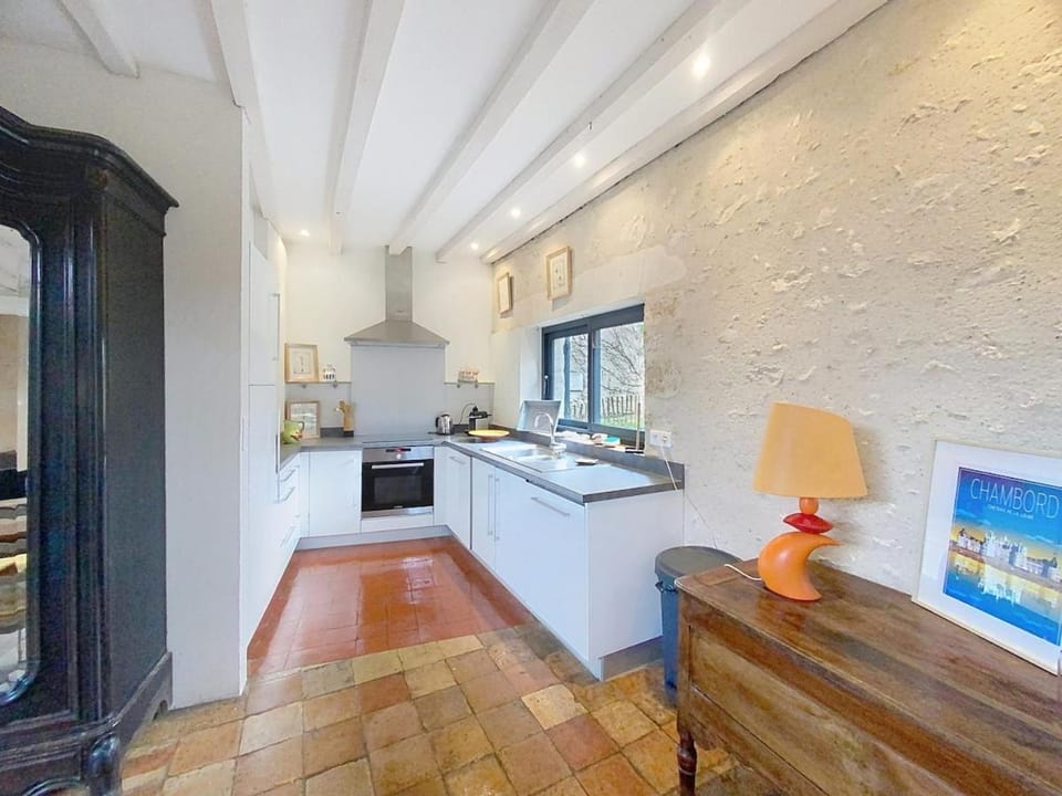 Kitchen or kitchenette, dishwasher, oven, stove