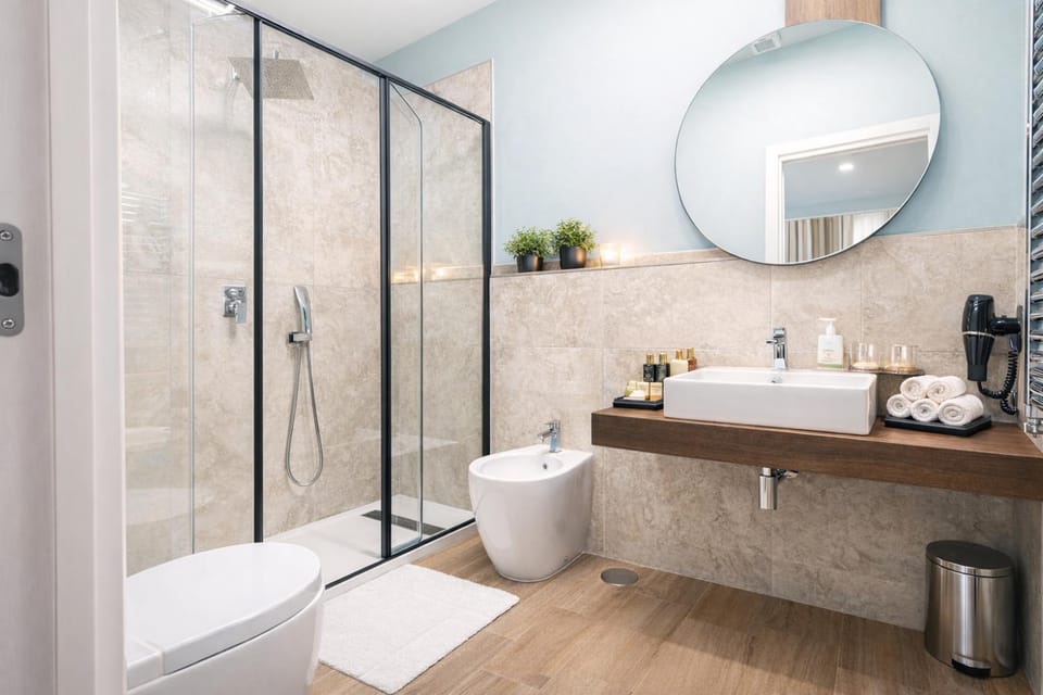 Shower, Toilet, Bathroom, bidet, hair dryier, towels
