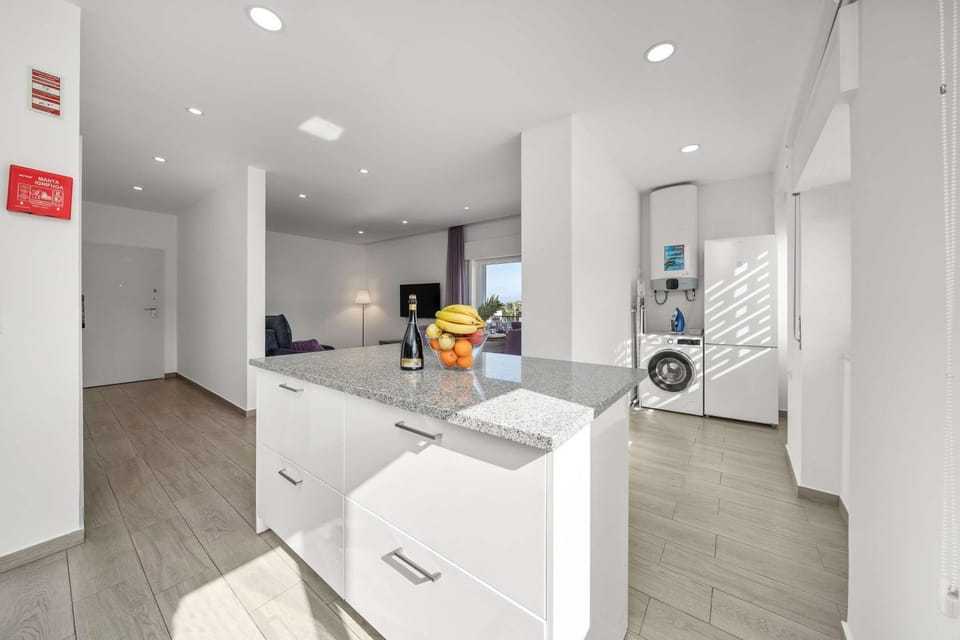 Kitchen or kitchenette, washing machine