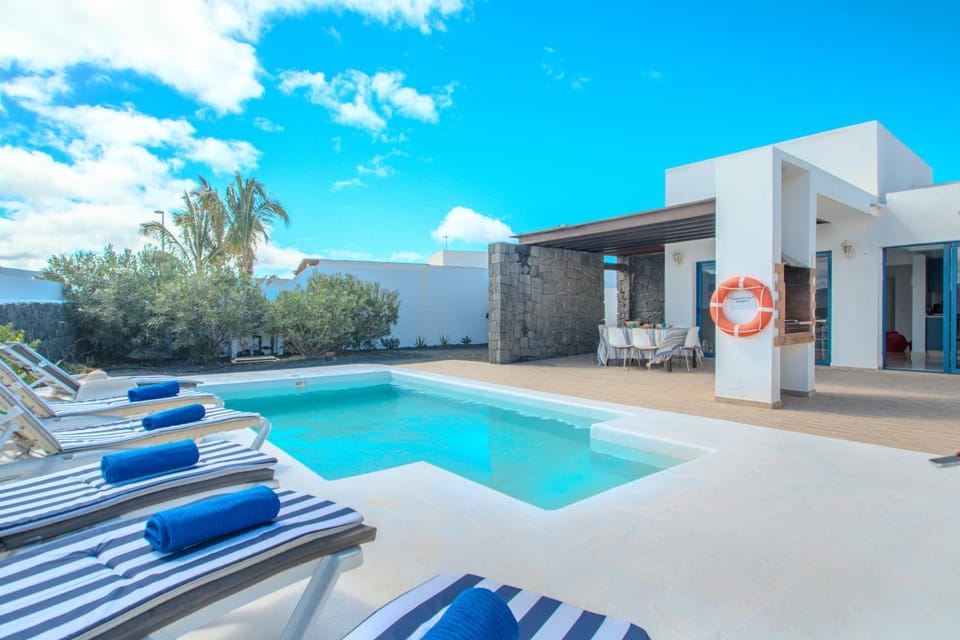 Property building, Living room, Swimming pool