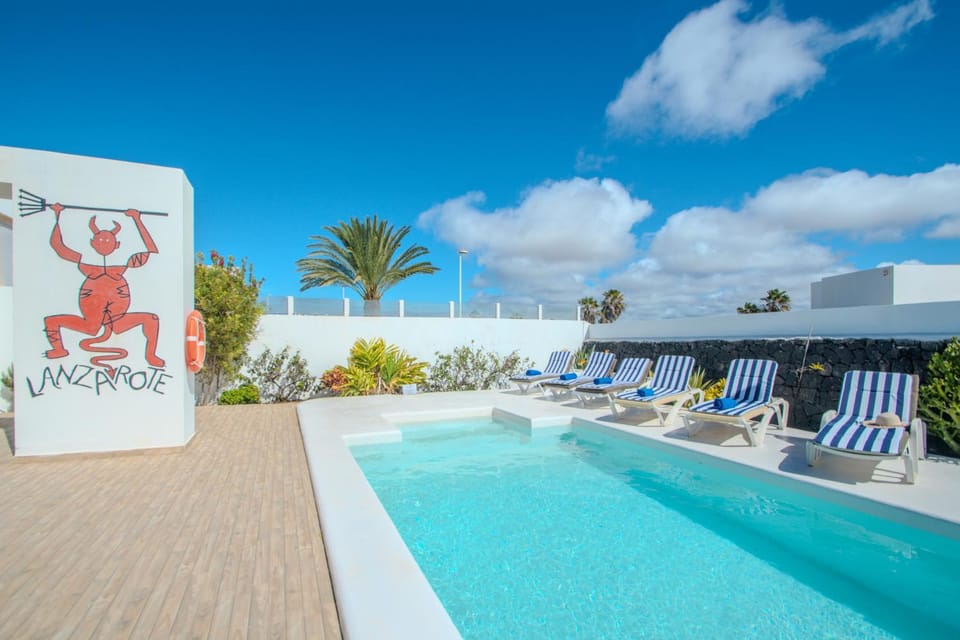 Property building, Living room, Swimming pool