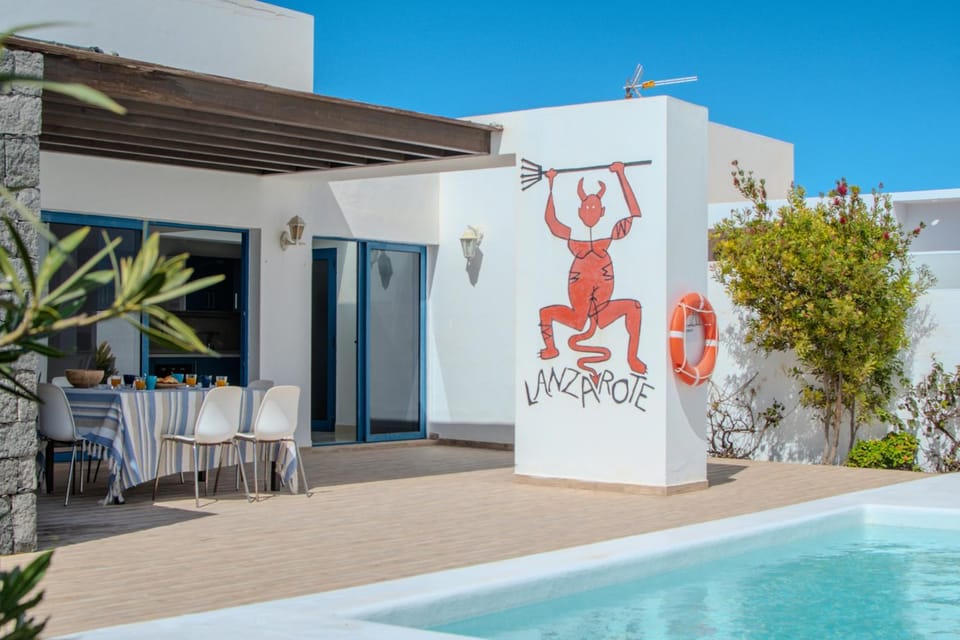 Property building, Living room, Swimming pool