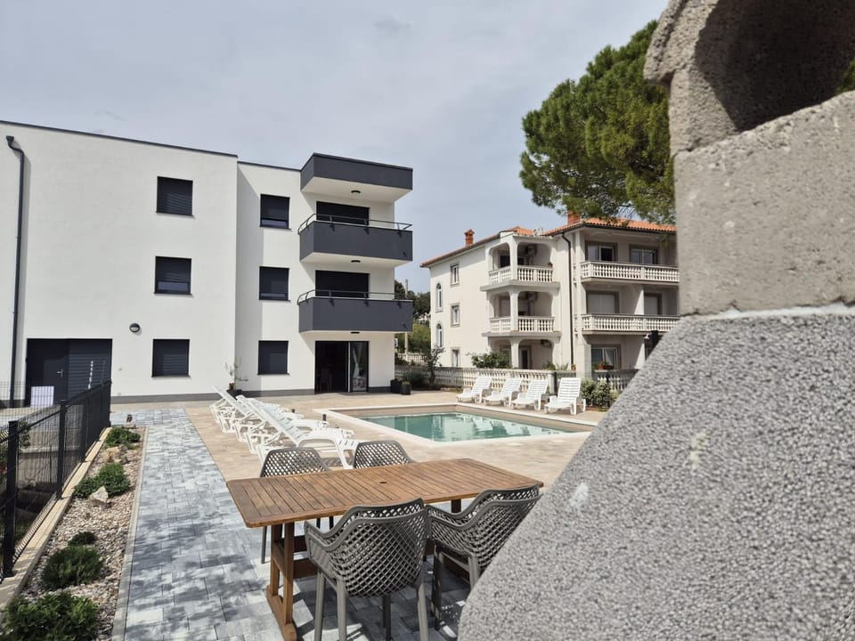 Property building, Seating area, Swimming pool, sunbed